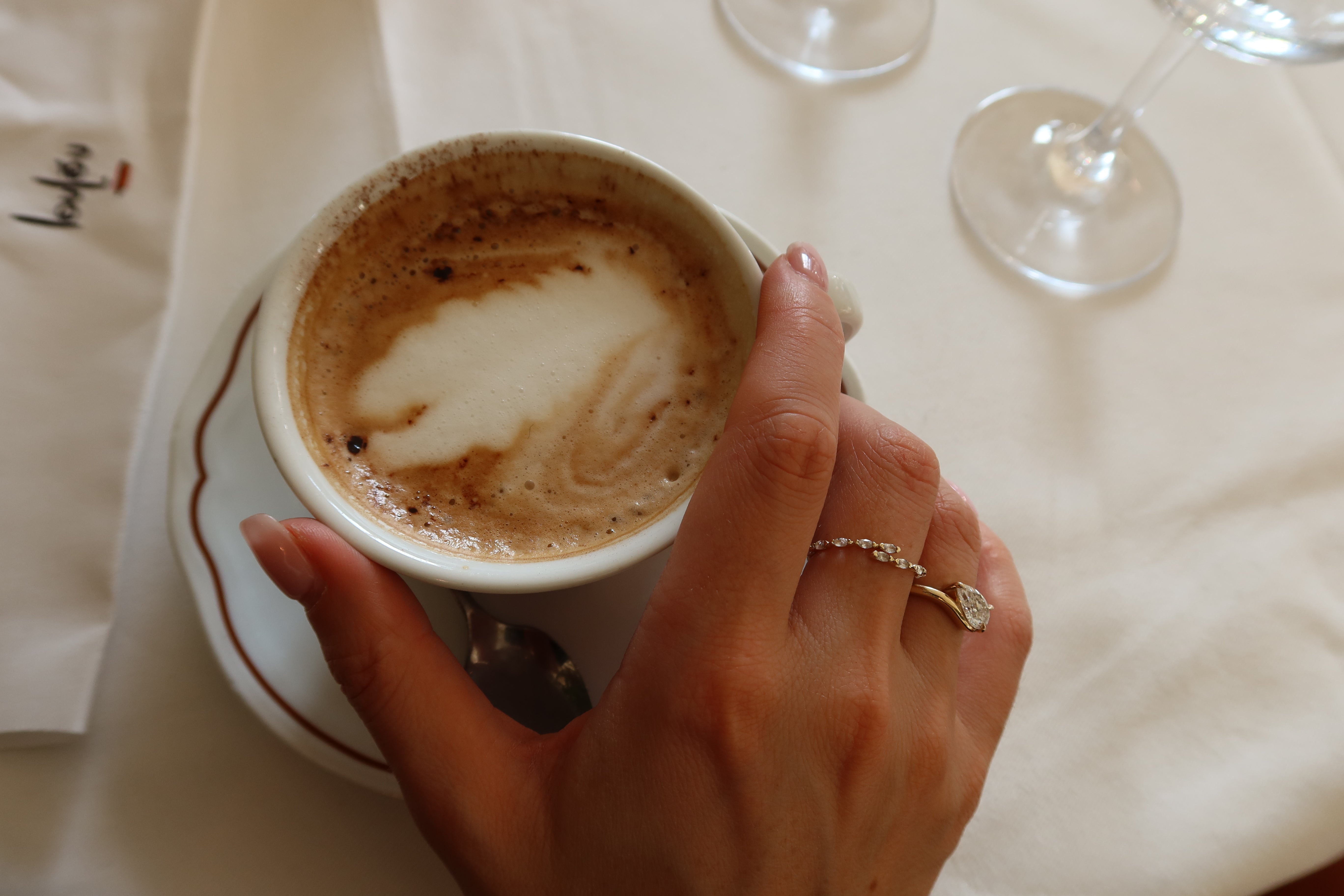 10 karat yellow gold wrap ring with white sapphire stones
