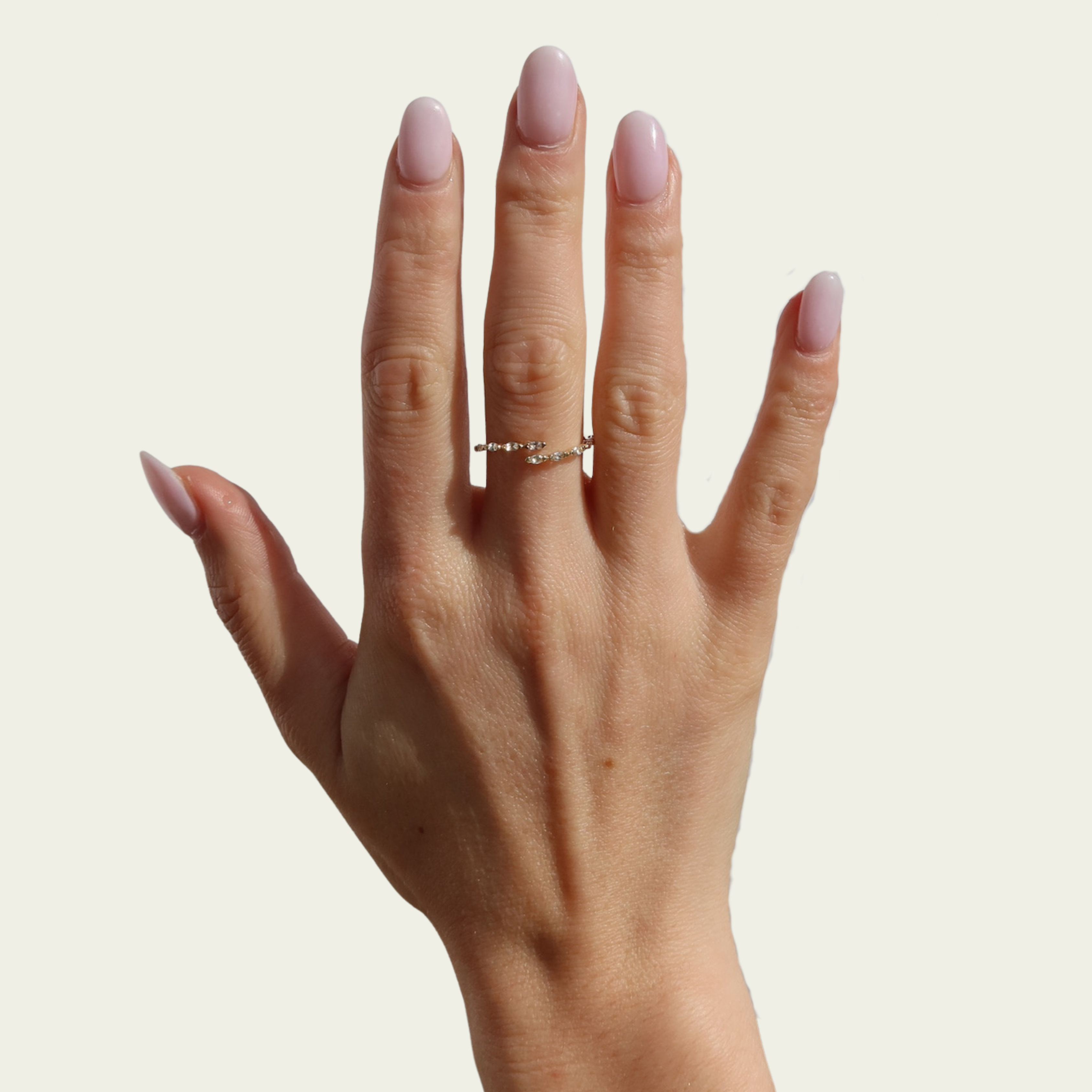 10 karat yellow gold wrap ring with white sapphire stones