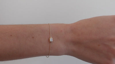 dainty solid gold bracelet with white sapphire